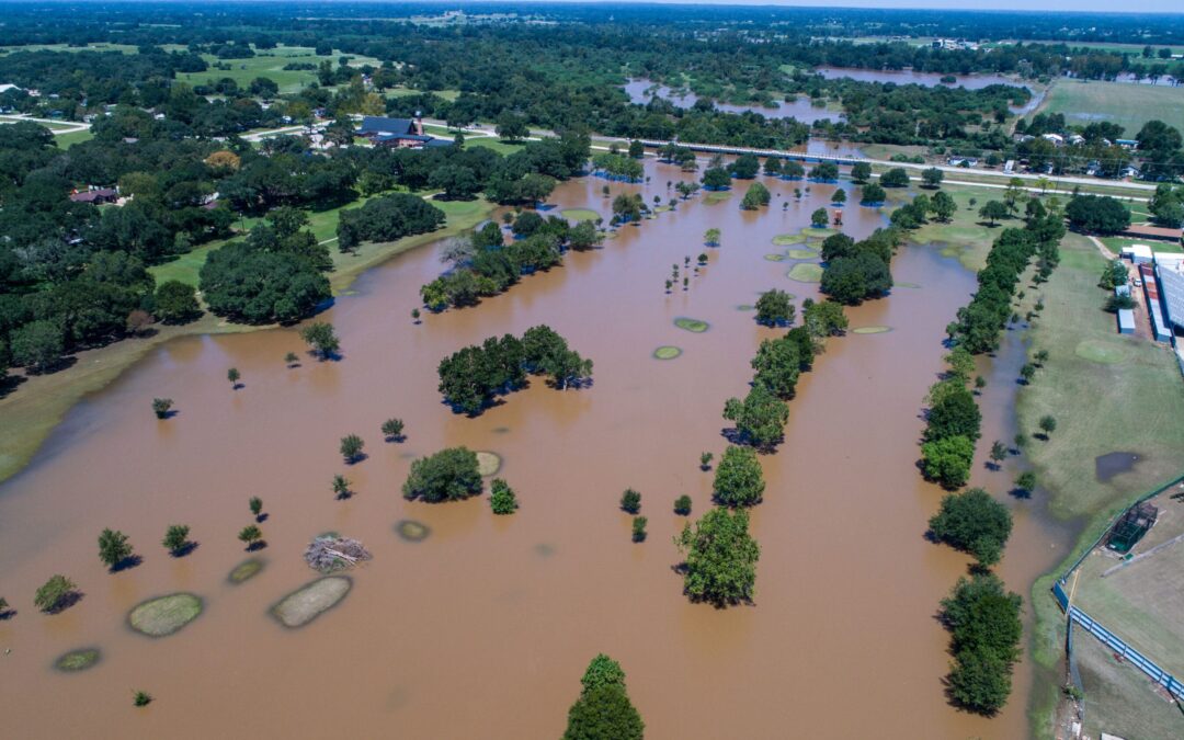 aerial view above Flood waters Hurricane Harvey Destruction Path through the small Town of Columbus , Texas